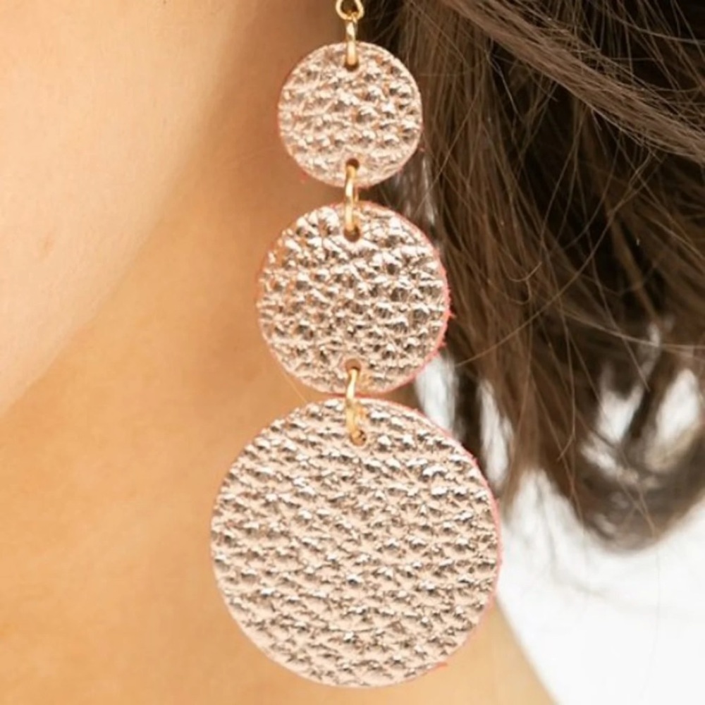 NWT. Leather dangle drop earrings.
